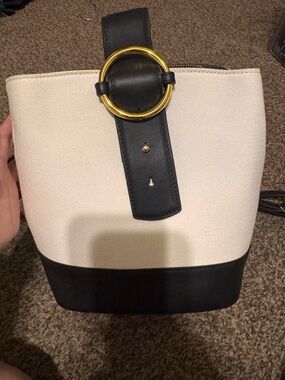 Canvas and Leather Two-Tone Bucket and backpack Bag with Gold Ring Accent